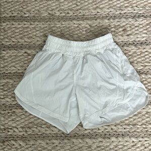 White hotty hot lululemon shorts with nude lining